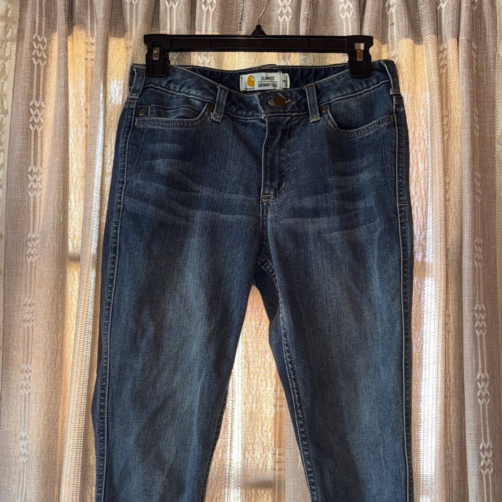 Carhartt Slim Fit Skinny Leg Jeans in Dark Blue with Gold Logo